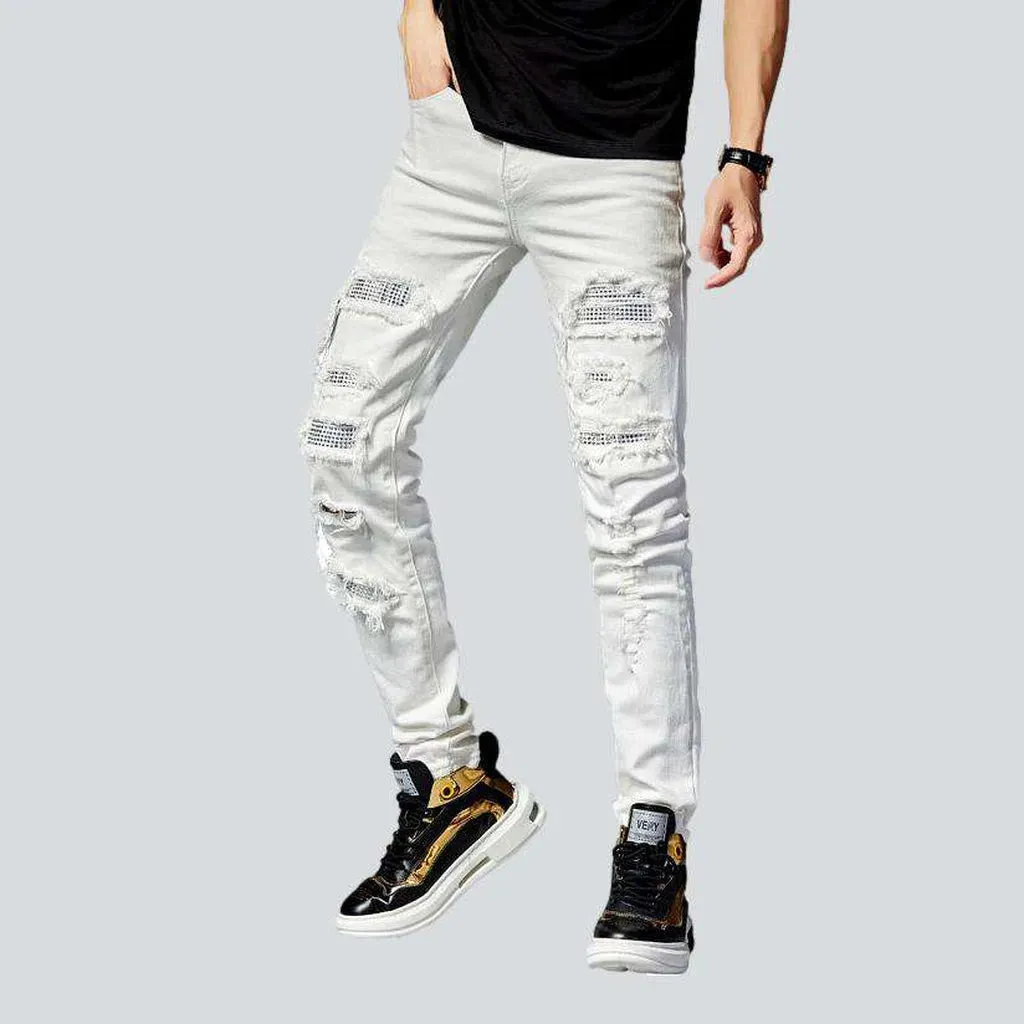 Embellished patchwork distressed jeans